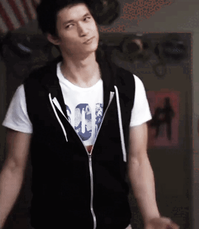 Man in Black Vest and White Skull T-Shirt