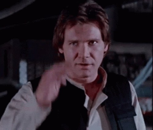 Man in Black Vest Pointing