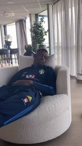 Man In Blue Adidas Jacket Sleeping In Chair GIF