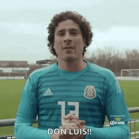 Man in Blue Adidas Jersey Number 13