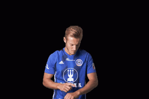 Man In Blue Adidas Shirt Hands On Hips GIF