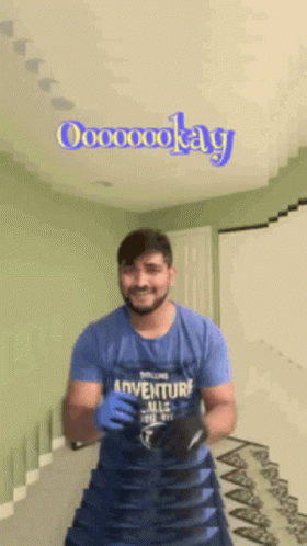 Man In Blue Adventure Shirt GIF