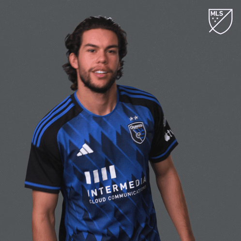 Man in Blue and Black Jersey