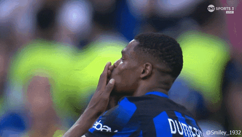 Man in Blue and Black Jersey with Durre