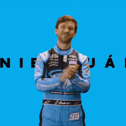 Man in Blue and Black Wwex Racing Uniform