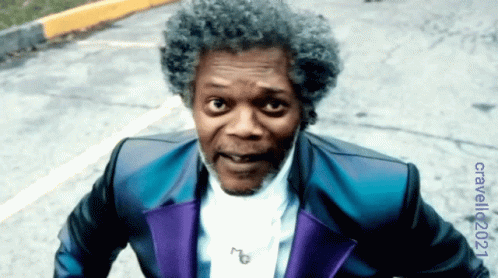 Man in Blue and Purple Suit with 2021