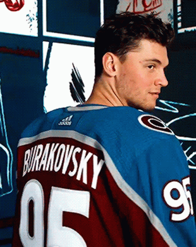 Man in Blue and Red Jersey Burakovsky