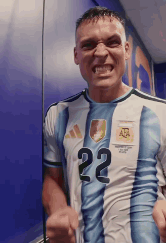 Man in Blue and White Jersey Number 22