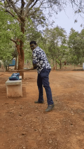 Man in Blue and White Shirt in Park