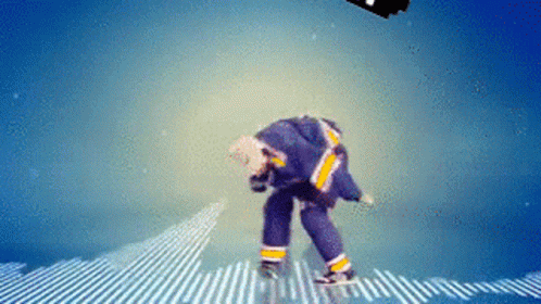 Man in Blue and Yellow Hockey Uniform