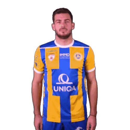Man in Blue and Yellow Jersey With Uniqa
