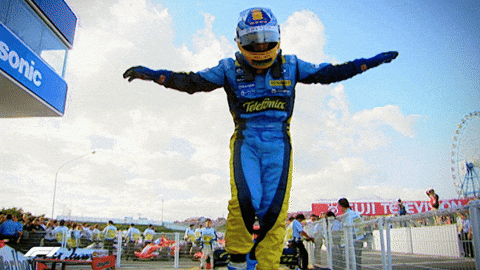 Man In Blue And Yellow Racing Suit With Telebnica GIF