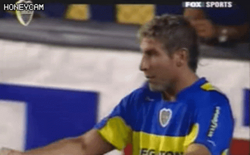 Man in Blue and Yellow Soccer Uniform