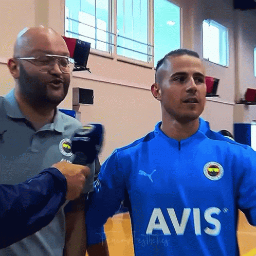 Man in Blue Avis Shirt