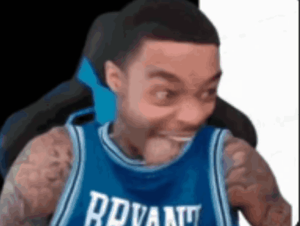 Man in Blue Basketball Jersey Making Funny Face
