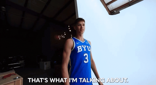 Man in Blue BYU Jersey Talking
