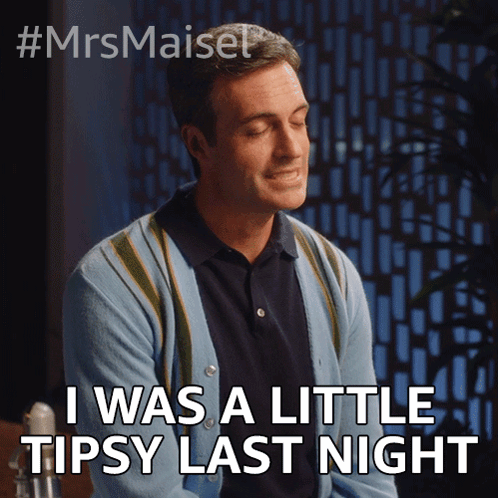 Man in Blue Cardigan Saying I Was a Little Tipsy Last Night