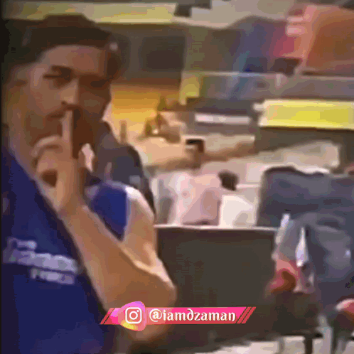 Man In Blue Dodgers Shirt Shushing GIF