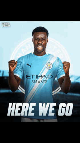 Man in Blue Etihad Jersey Fist Pump