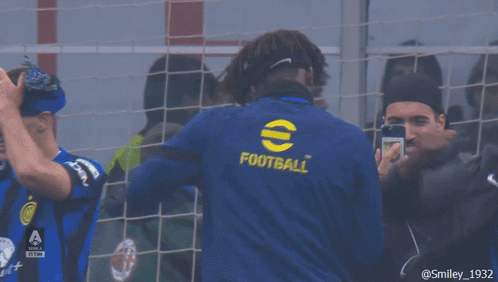 Man in Blue Football Shirt at Soccer Net