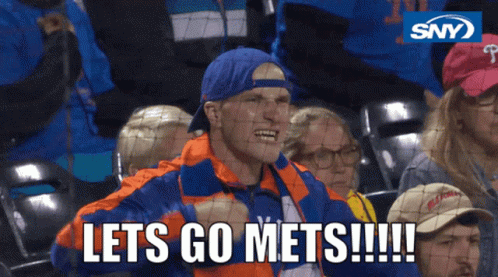 Man in Blue Hat and Orange Jacket Saying Lets Go Mets