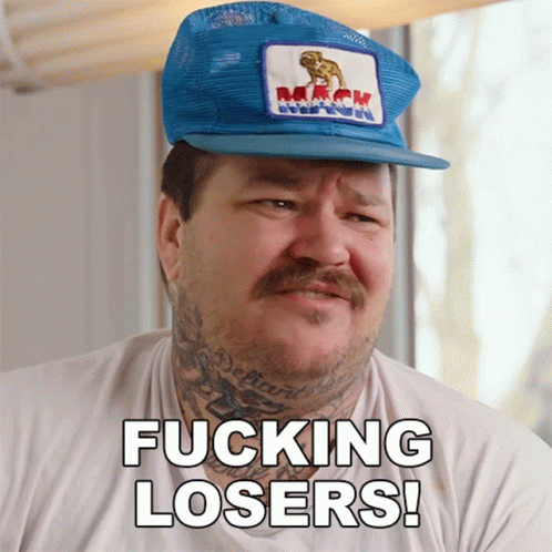 Man in Blue Hat and White Shirt Saying Fucking Losers