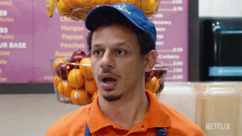 Man in Blue Hat Saying Juice
