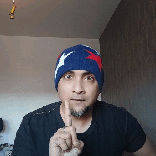 Man in Blue Hat with Red White Blue Star