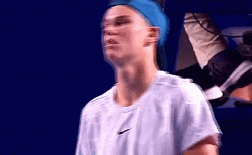 Man in Blue Headband and White Shirt