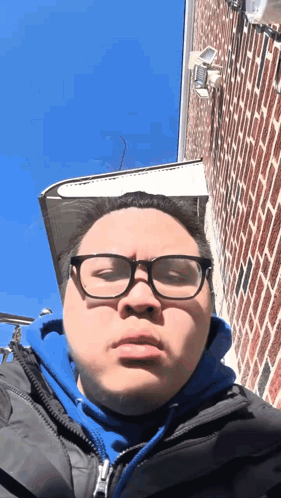Man In Blue Hoodie And Glasses GIF
