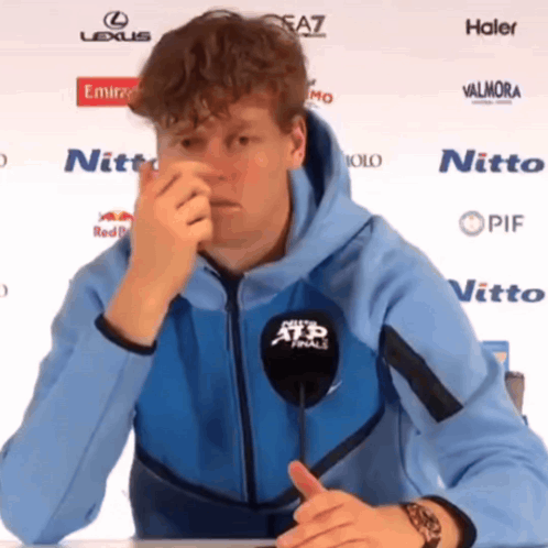 Man In Blue Hoodie At Microphone Saying ATP Finals GIF