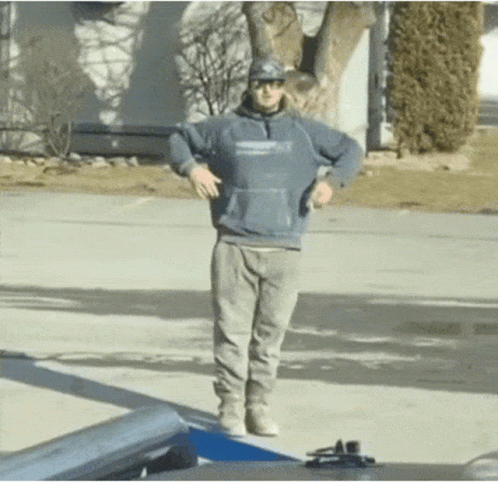 Man in Blue Hoodie Standing on Ramp
