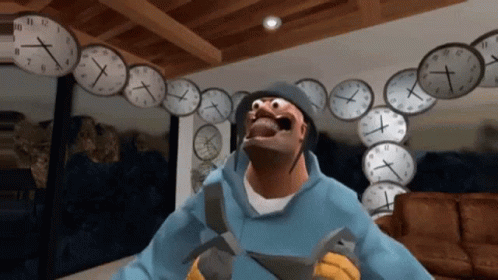 Man in Blue Hoodie Surrounded by Clocks at 1 and 12