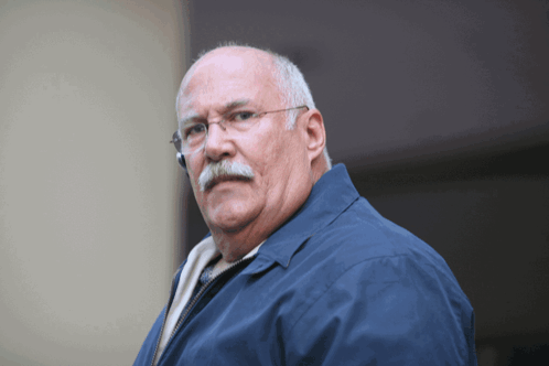 Man In Blue Jacket And Glasses GIF