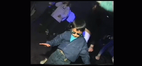 Man in Blue Jacket Dancing