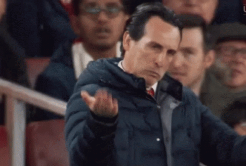 Man in Blue Jacket Giving Thumbs Up