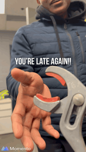 Man in Blue Jacket Holding Wrench You're Late Again