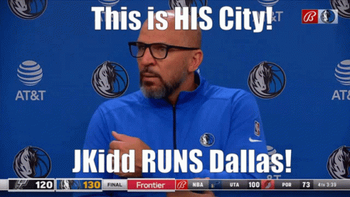 Man In Blue Jacket In Front Of AT&T Banner GIF