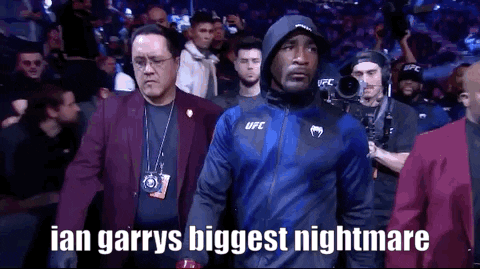 Man In Blue Jacket Leaving Boxing Ring GIF