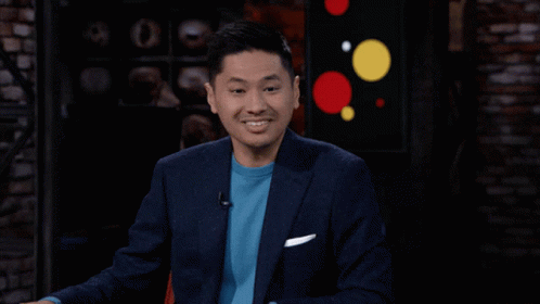 Man in Blue Jacket Making Funny Face