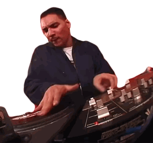 Man in Blue Jacket Playing DMC Mixer