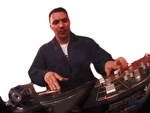 Man in Blue Jacket Playing Pioneer Record