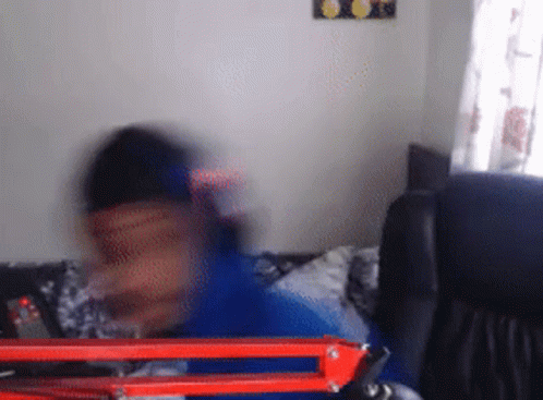 Man In Blue Jacket Rubbing Lotion On Hands GIF