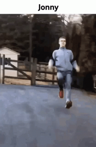 Man in Blue Jacket Running Jonny