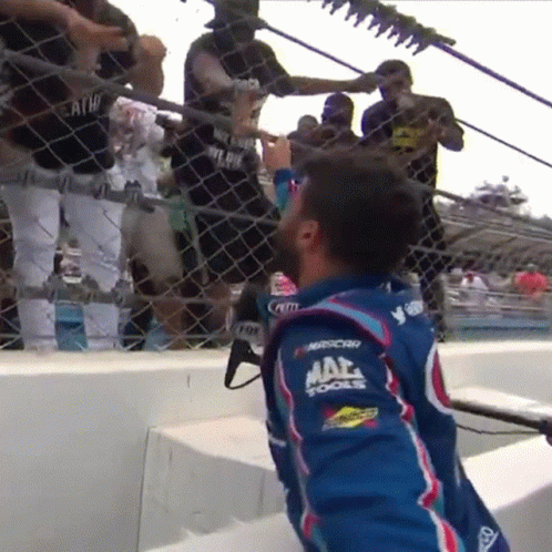 Man in Blue Jacket Saying Max