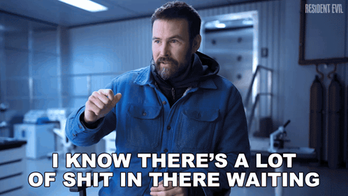 Man in Blue Jacket Says I Know There Is A Lot Of Shit In There Waiting