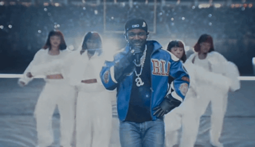 Man In Blue Jacket Singing GIF