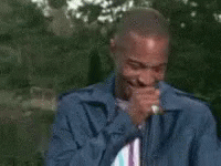 Man in Blue Jacket Singing