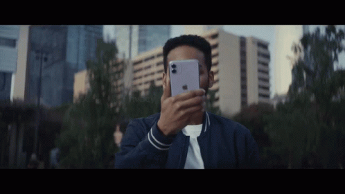 Man In Blue Jacket Taking Picture GIF