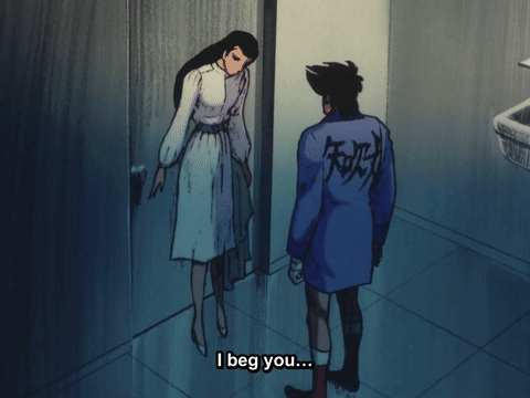 Man in Blue Jacket With Chinese Writing Talks to Woman in White Dress